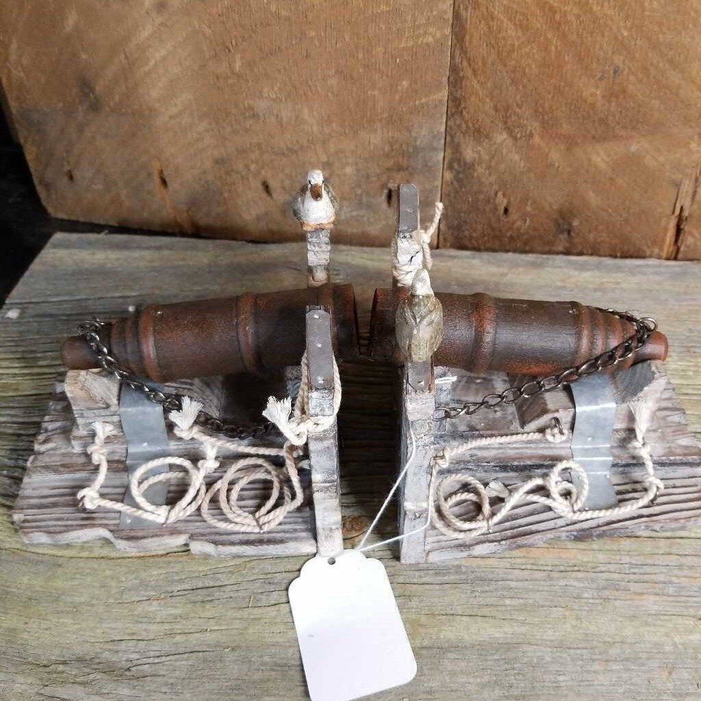 Cannon Bookends Folk art (JAS) upstairs booth