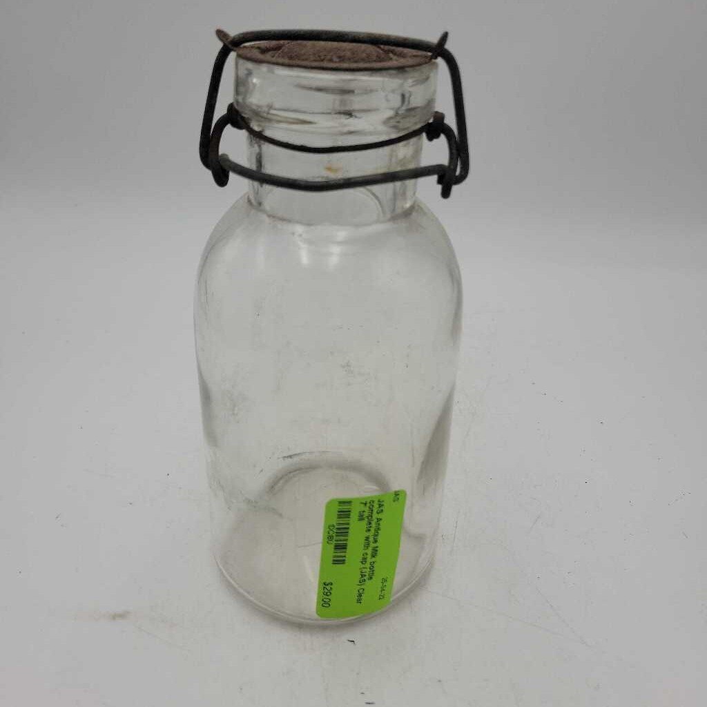 Antique Milk bottle complete with cap (JAS)