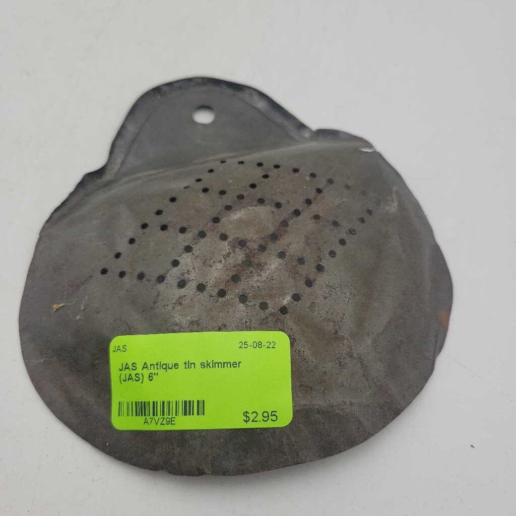 Antique tin skimmer (JAS)