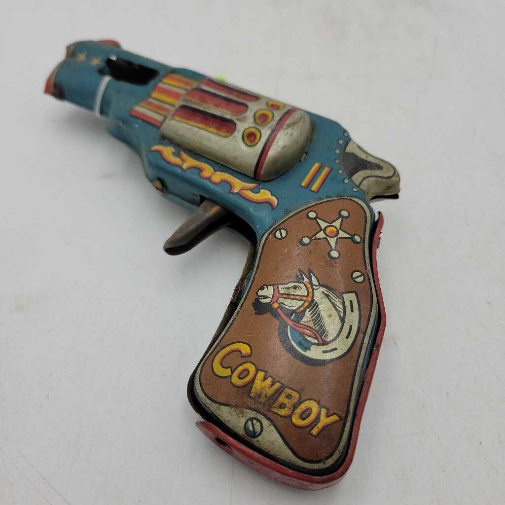 Tin 1950's Clicker Revolver toy gun (BS)