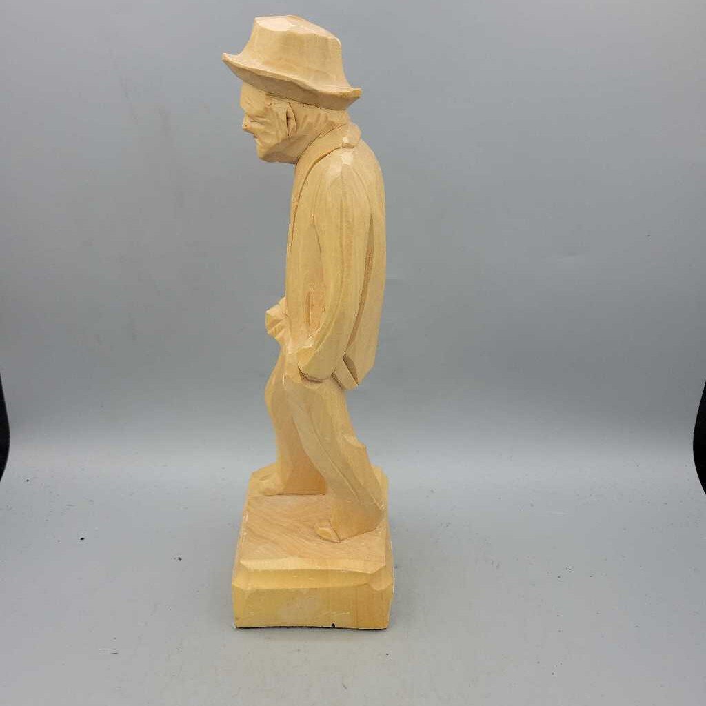 Hand Carved Wooden Man holding bag (JAS)