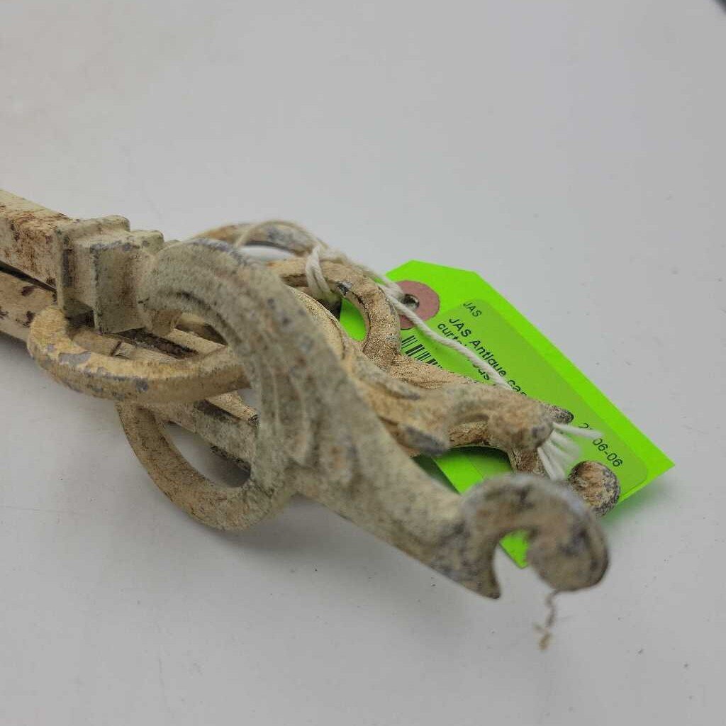 Antique cast metal curtain rods (JAS)