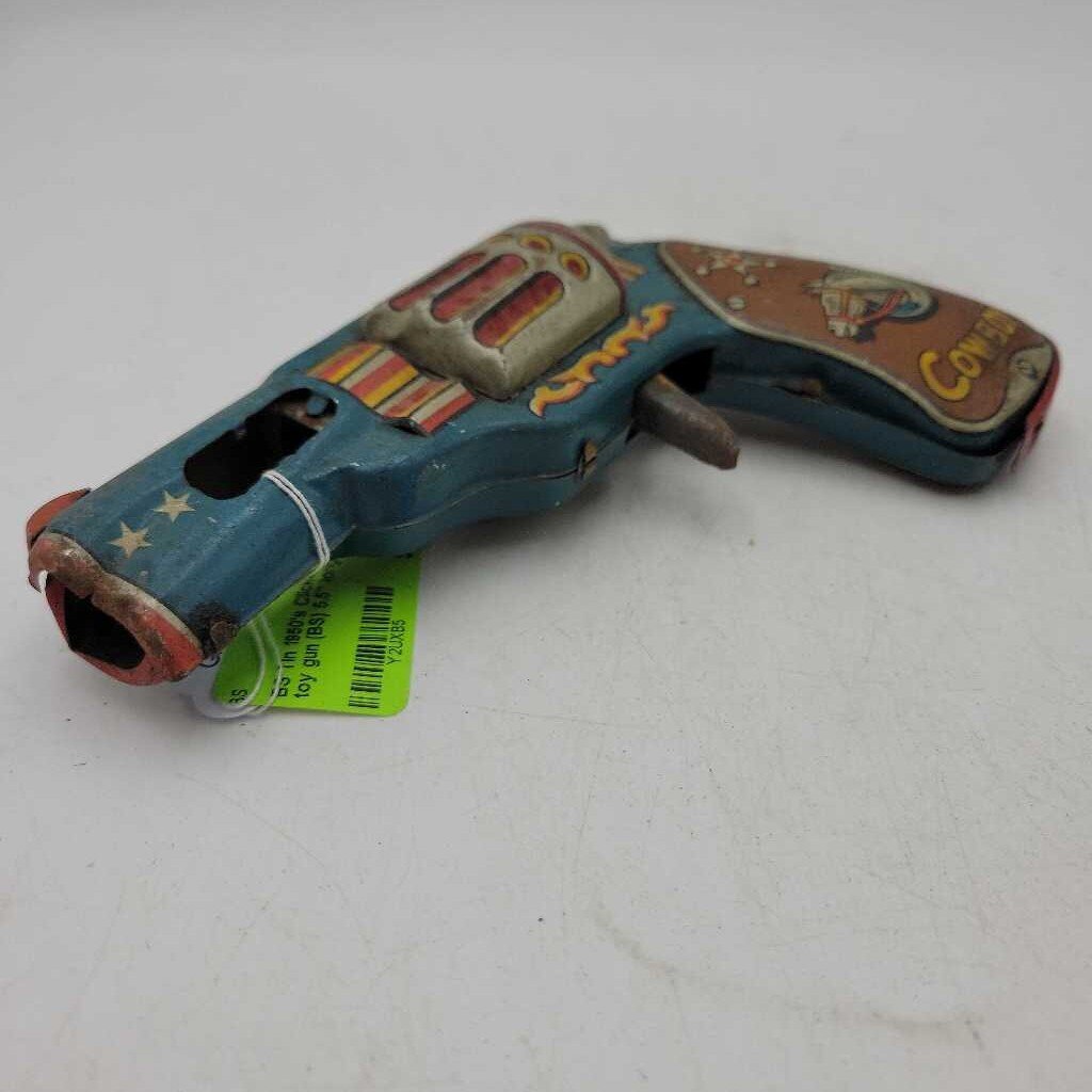 Tin 1950's Clicker Revolver toy gun (BS)
