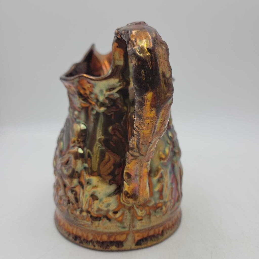 Copper lusterware pitcher with cherubs (MARR)