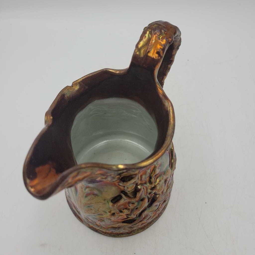 Copper lusterware pitcher with cherubs (MARR)