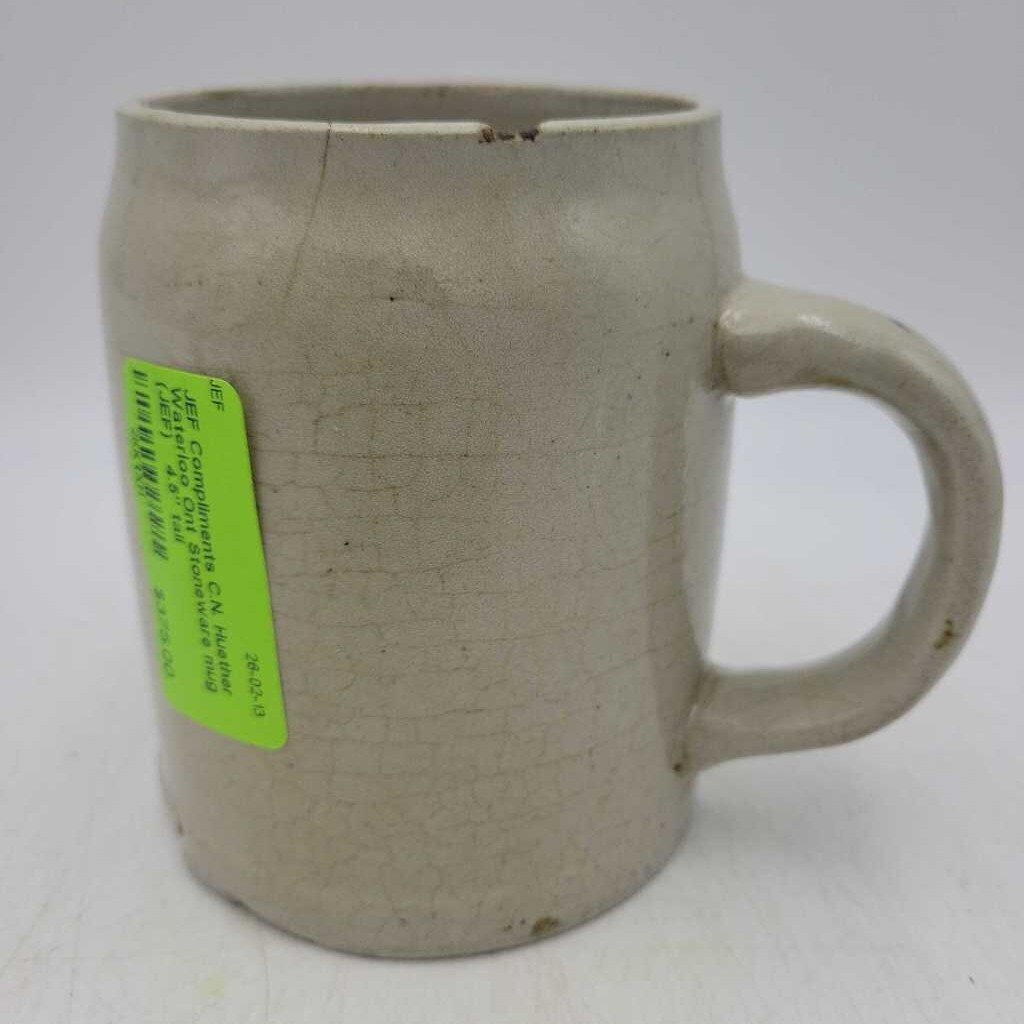 Compliments C.N. Huether Waterloo Ont Stoneware mug (JEF)
