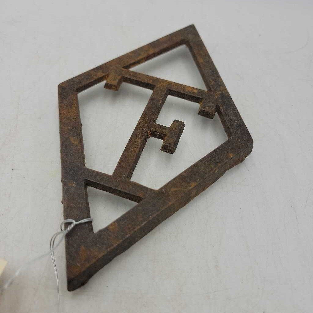 Cast Iron Trivet T Eaton (JAS)