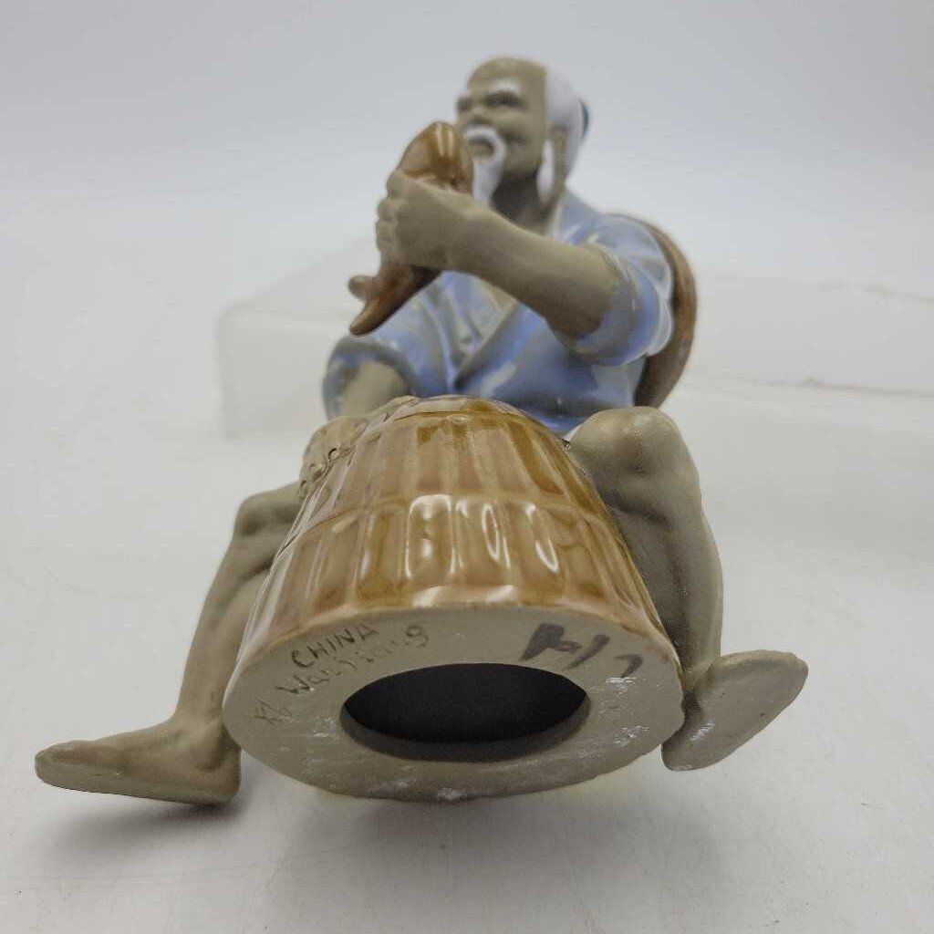 Mud Fisherman sitting with basket (YVO) (609)