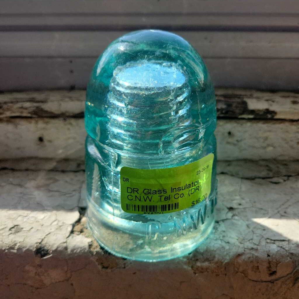 Glass Insulator C.N.W. Tel Co. (DR)